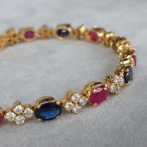 ML057 Or 18K, rubis, saphirs et diamants